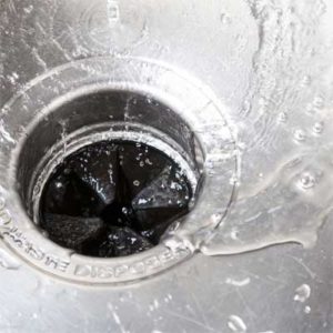 Water draining into clean garbage disposal